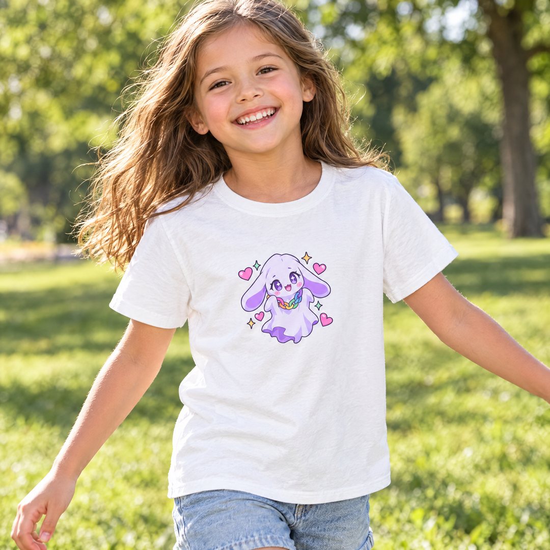 Child wearing the Ghost Bunny Kids Tee in a sunny park